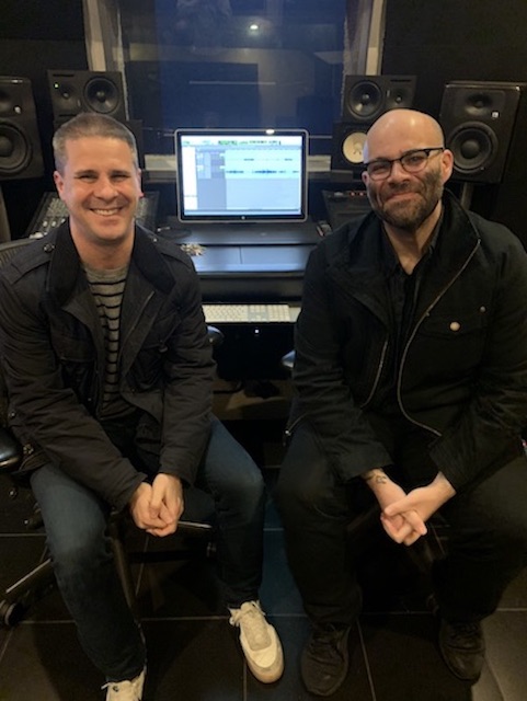 Dan Pfeiffer and Mike Isaac in control room A 400x300